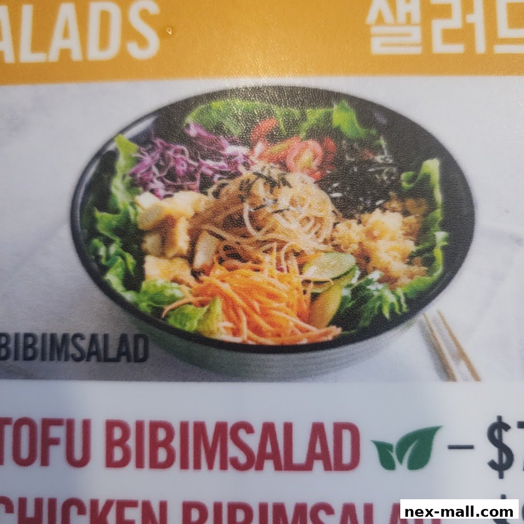 A close-up of a Tofu Bibim Salad from JINJJA Chicken.