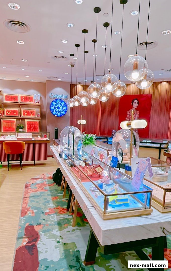 Interior of a modern jewelry store with display cases, elegant lighting, and a vibrant rug.
