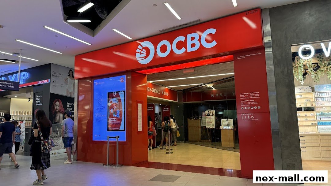 The OCBC Bank branch entrance with self-service machines and a digital display.