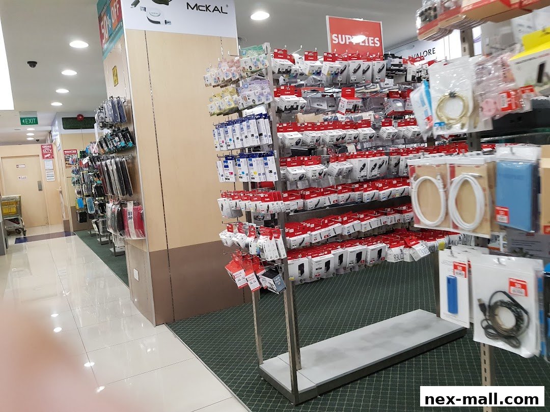 Interior view of a retail store showcasing a wide variety of electronic accessories and supplies.