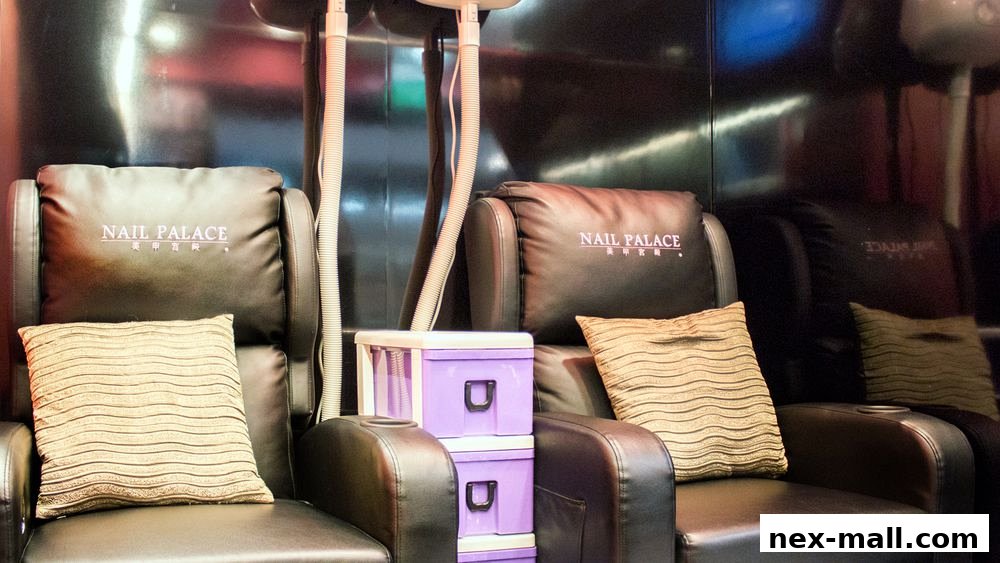 Comfortable nail salon chairs with decorative pillows and purple storage boxes.