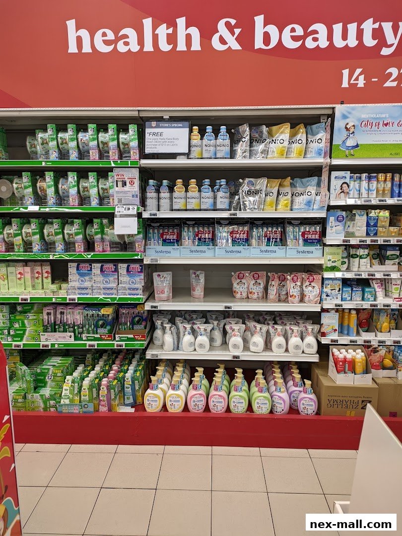 Shelves stocked with health and beauty products, including body wash, toothpaste, and hand soap.