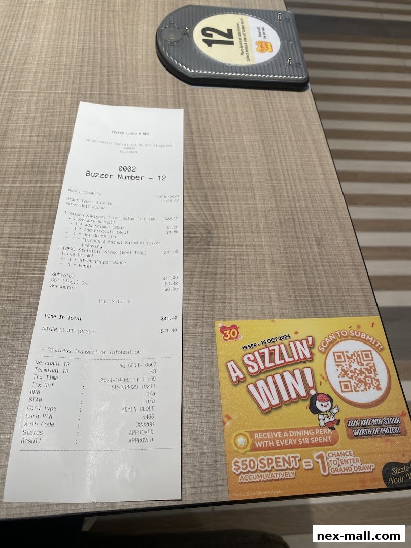 A receipt from Pepper Lunch with a promotional flyer for a contest.