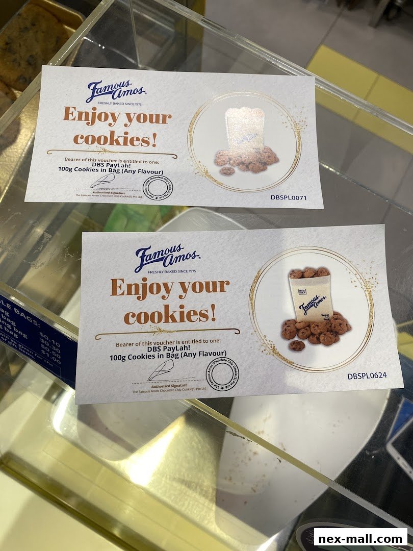 Two Famous Amos vouchers offering 100g cookies in a bag.