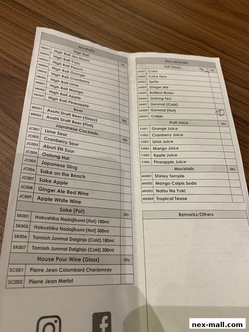 A menu from Aburi-EN Nex featuring alcoholic and non-alcoholic beverages, including high balls, beers, sake, wine, cocktails, and mocktails.