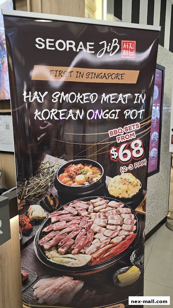 A banner advertising SEORAE JIB's hay-smoked meat in Korean Onggi Pot, with BBQ sets from $68.