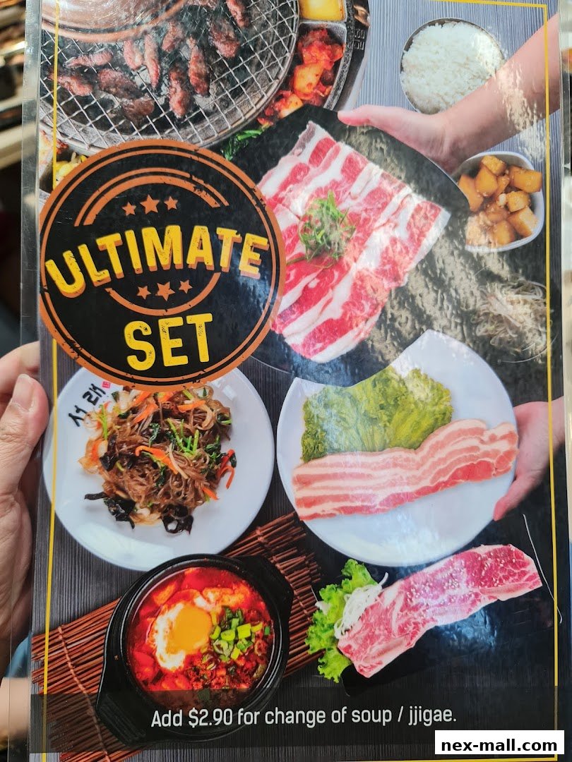 A menu featuring the 'Ultimate Set' with Korean BBQ meats, japchae, and jjigae.