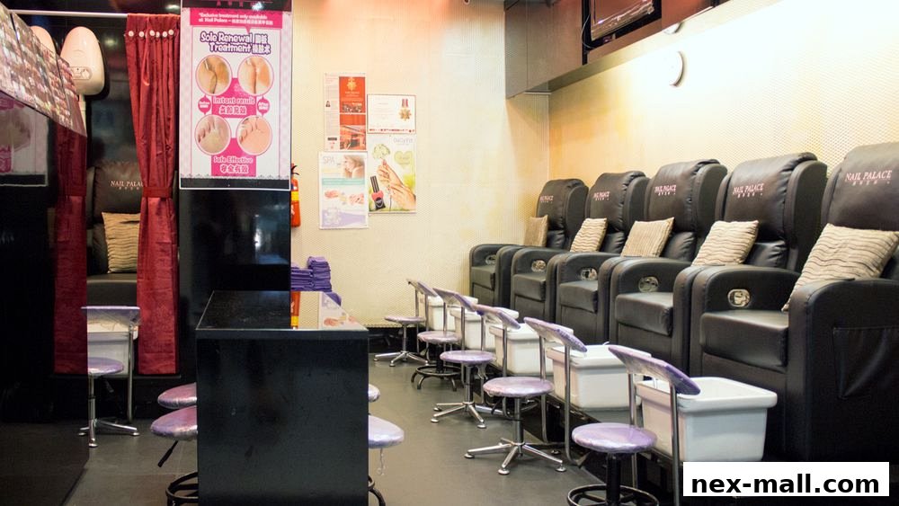 Interior of a nail salon with multiple pedicure chairs and manicure stations.