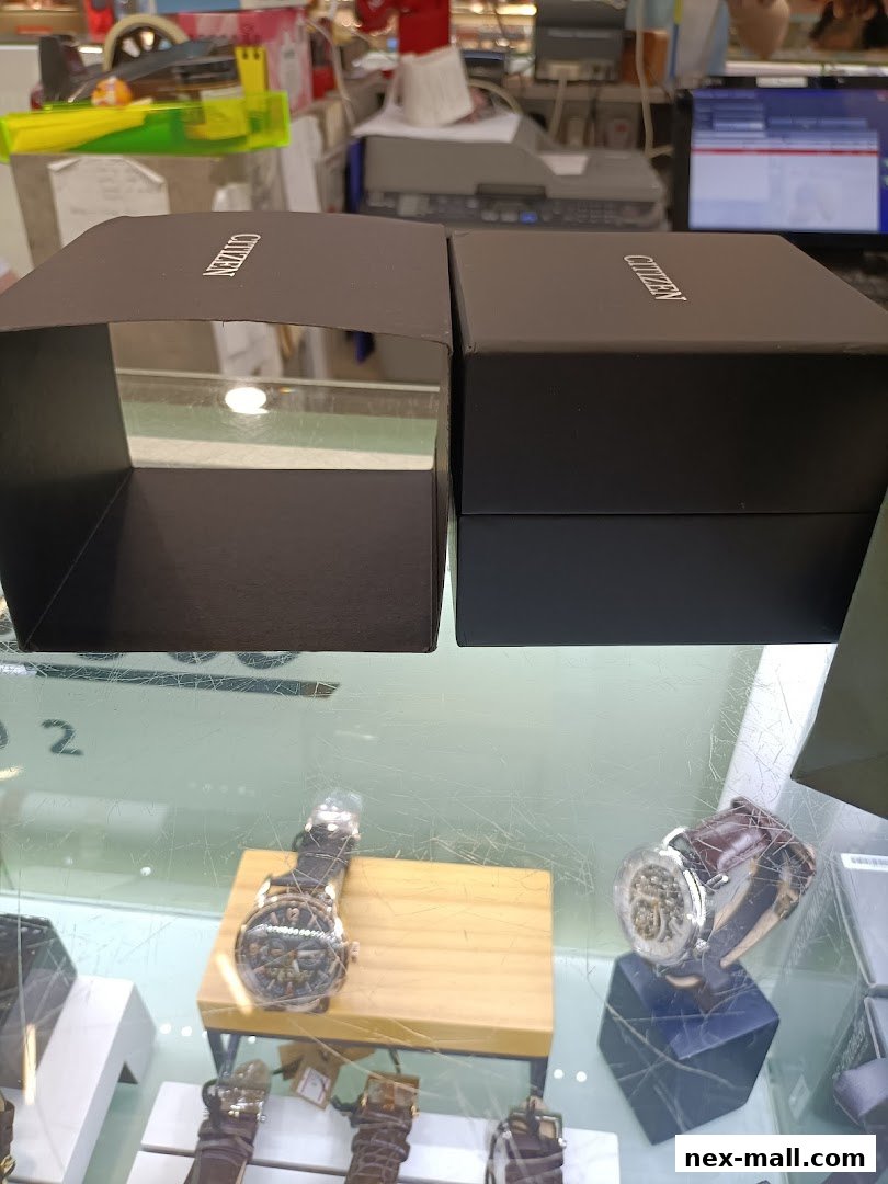 Citizen watch boxes and display of watches in a retail store.