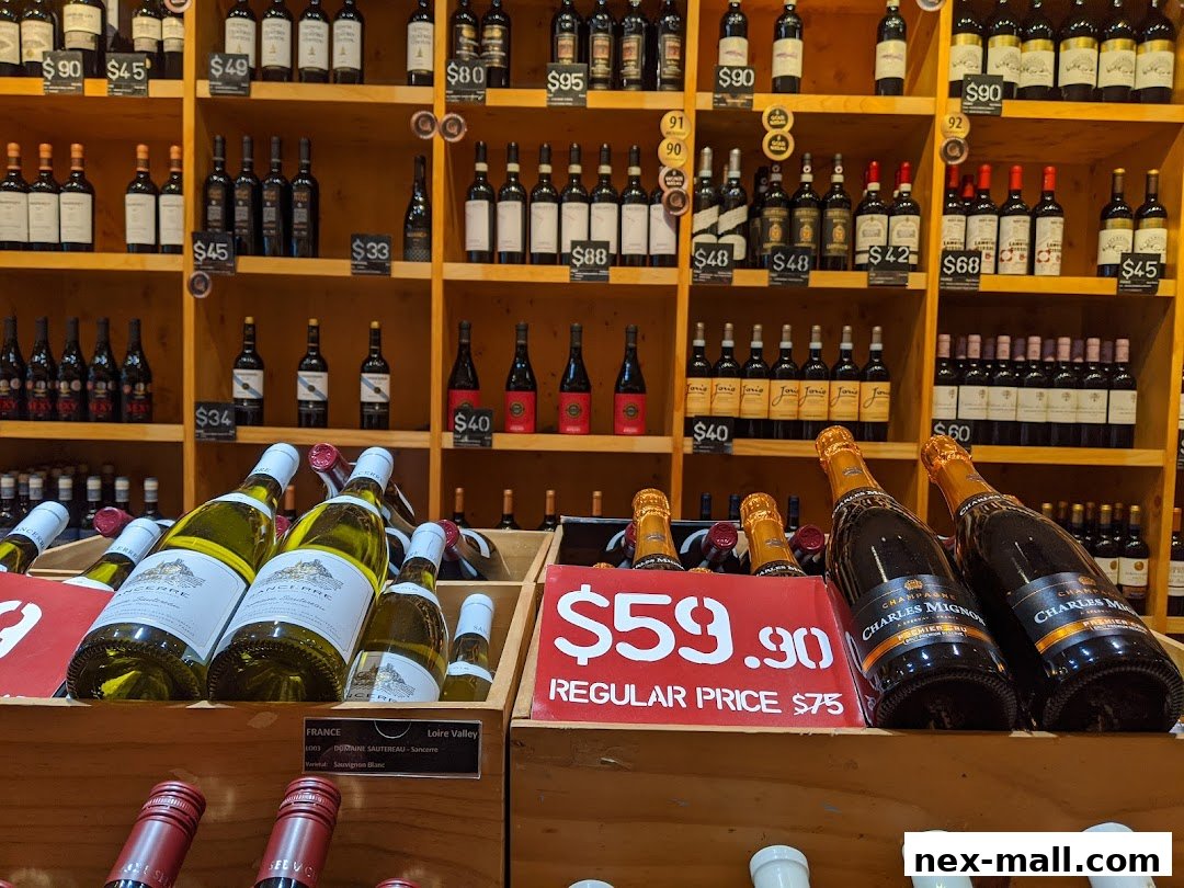 A display of various wine bottles on shelves, with prices and special offers visible.