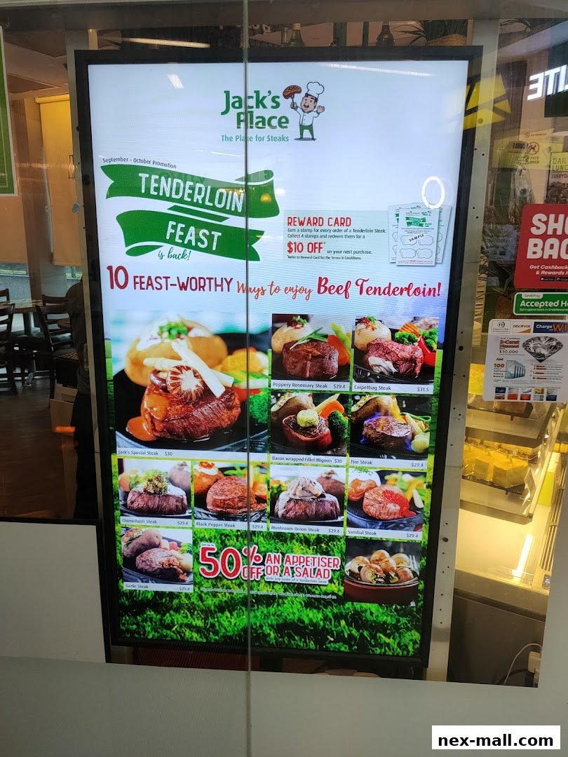 A digital menu board for Jack's Place showcasing various tenderloin steak dishes and a promotion.