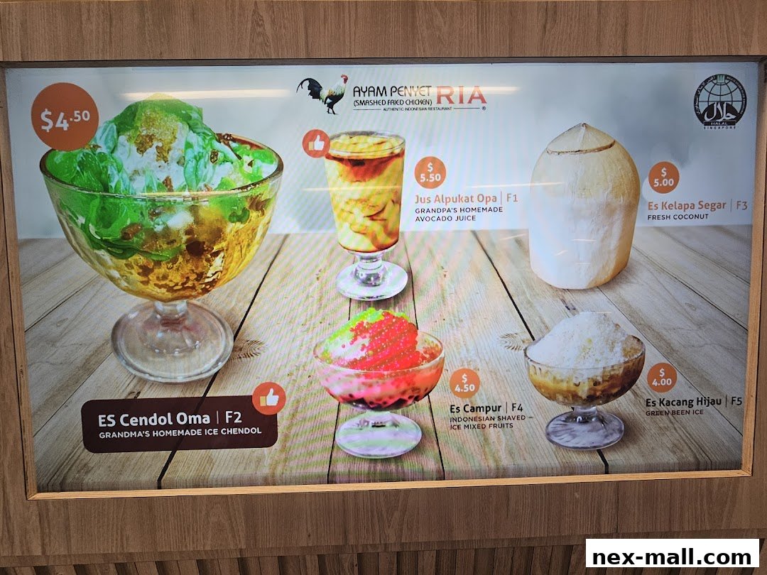 A digital menu board showcasing various Indonesian desserts and drinks with prices.