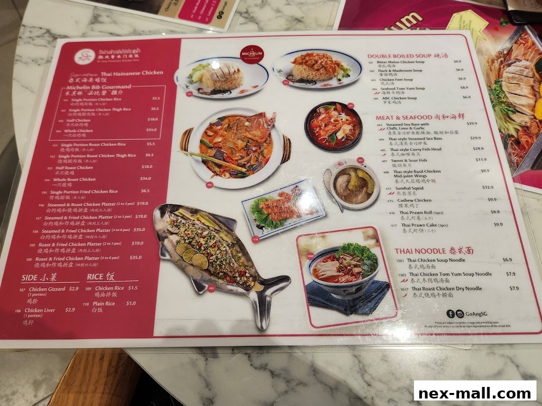 A menu from Go-Ang Pratunam Chicken Rice featuring Thai Hainanese Chicken and other dishes.
