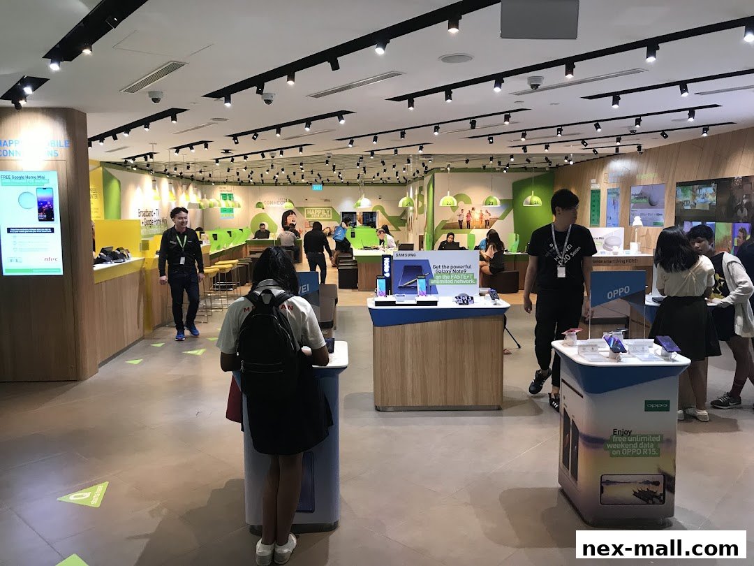 Interior of a brightly lit mobile phone store with customers and staff browsing products.