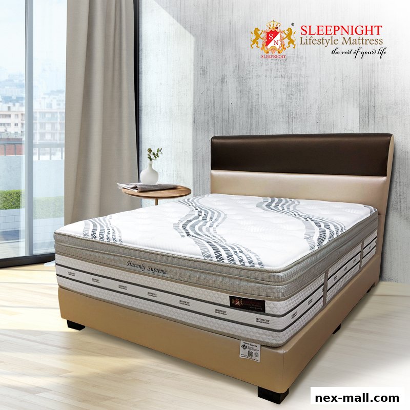 A luxurious SLEEPNIGHT mattress with a brown headboard and a modern design.