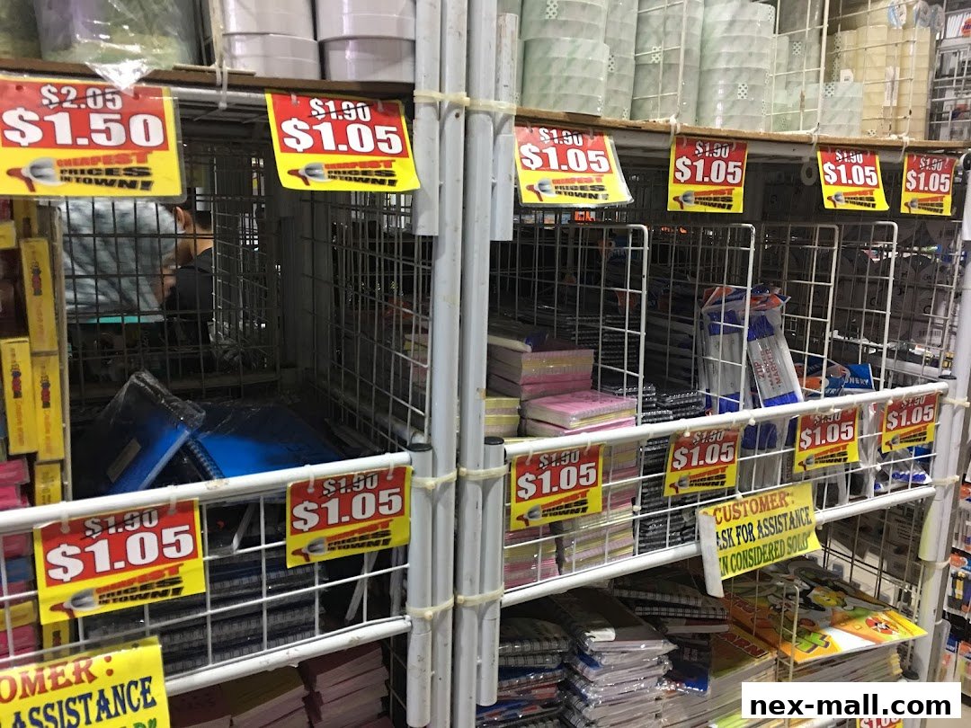 Shelves stocked with stationery items like notebooks and markers, with price tags displayed.