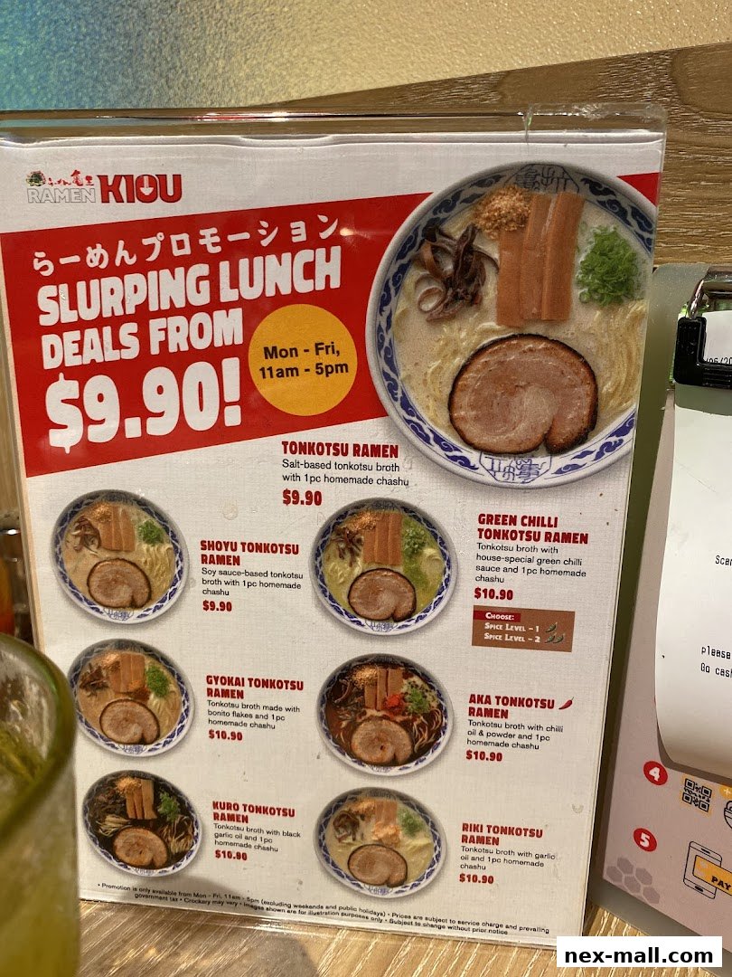 A menu board for Ramen Kiou featuring various tonkotsu ramen dishes and lunch deals.