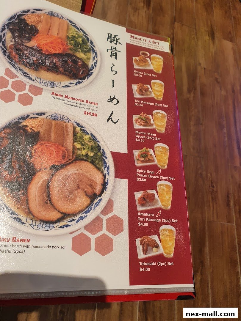 A menu featuring Aburi Nankotsu Ramen and various set meals with side dishes and drinks.