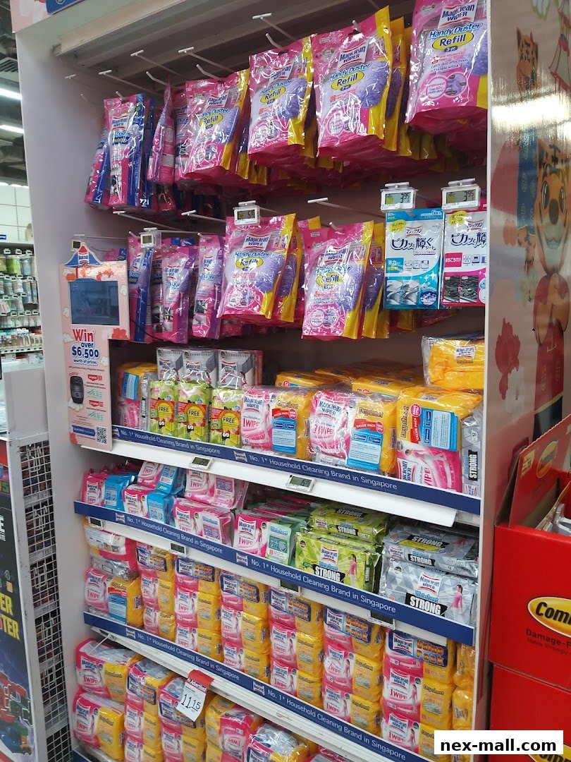 Shelves stocked with various cleaning wipes and duster refills.