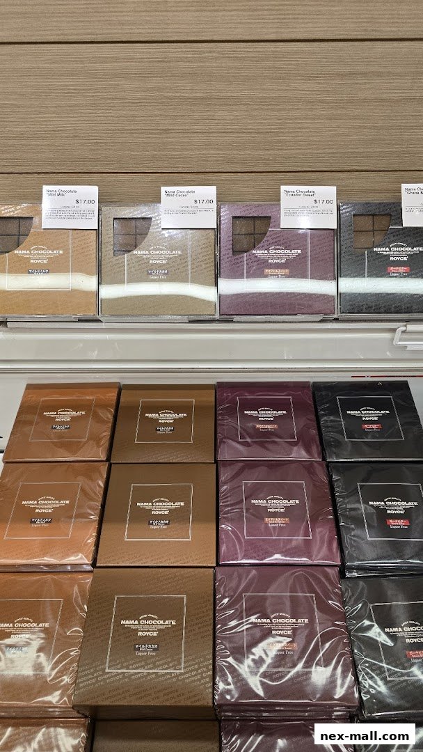 Rows of Royce Nama Chocolate boxes in various flavors, neatly displayed.
