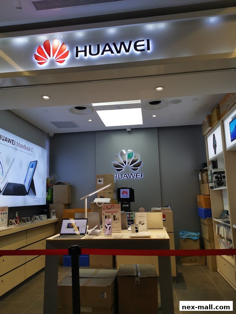 Interior of a Huawei Concept Store showcasing products and branding.