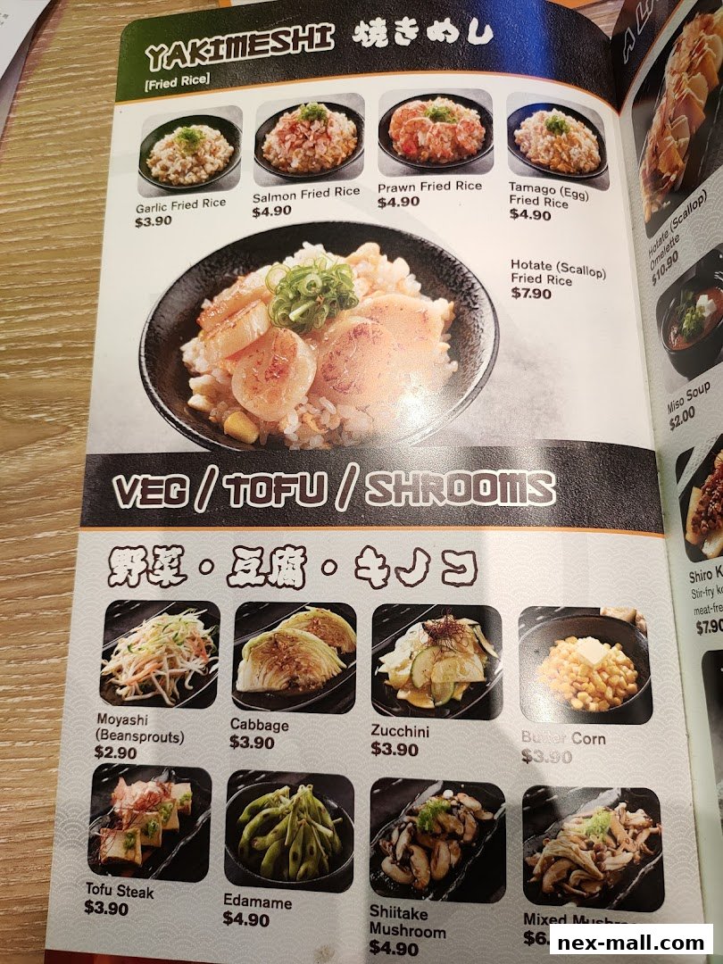 A menu page featuring various Japanese fried rice dishes and vegetable side dishes.