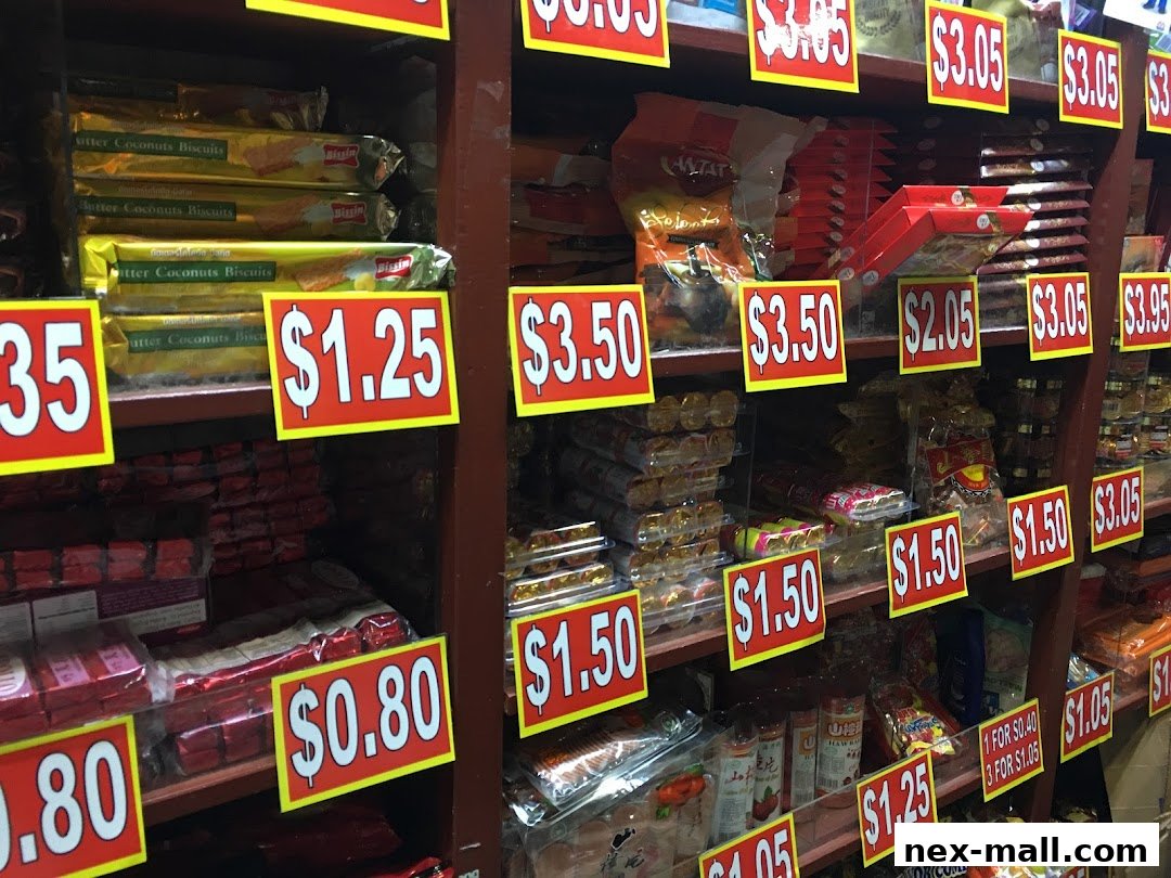 Shelves stocked with various snacks and biscuits, each with visible price tags.