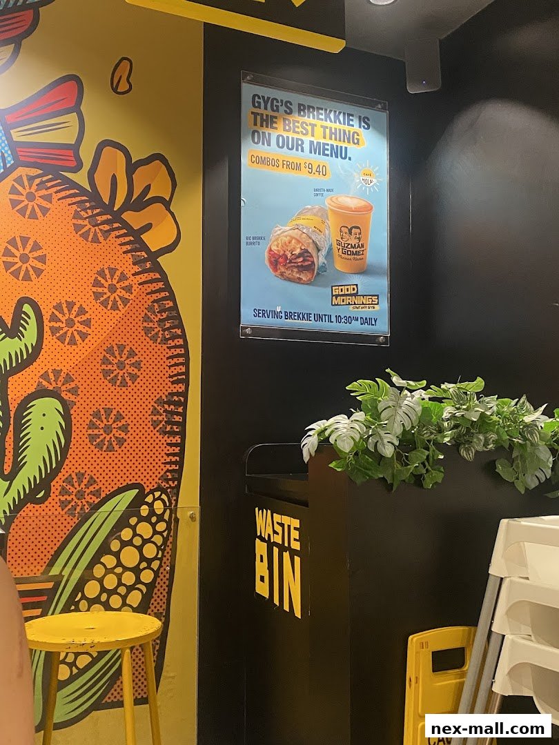A poster advertising Guzman y Gomez's breakfast burritos and coffee combos.