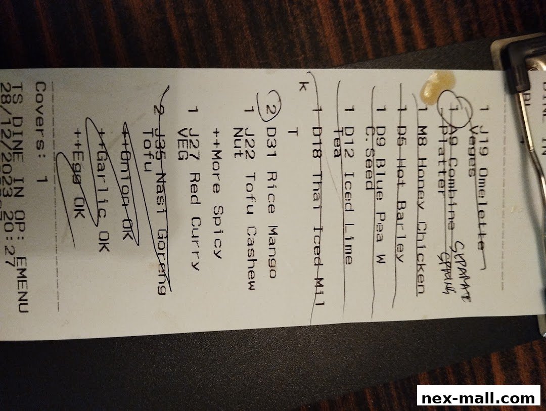 A receipt from Bali Thai NEX showing a list of ordered food items and modifications.