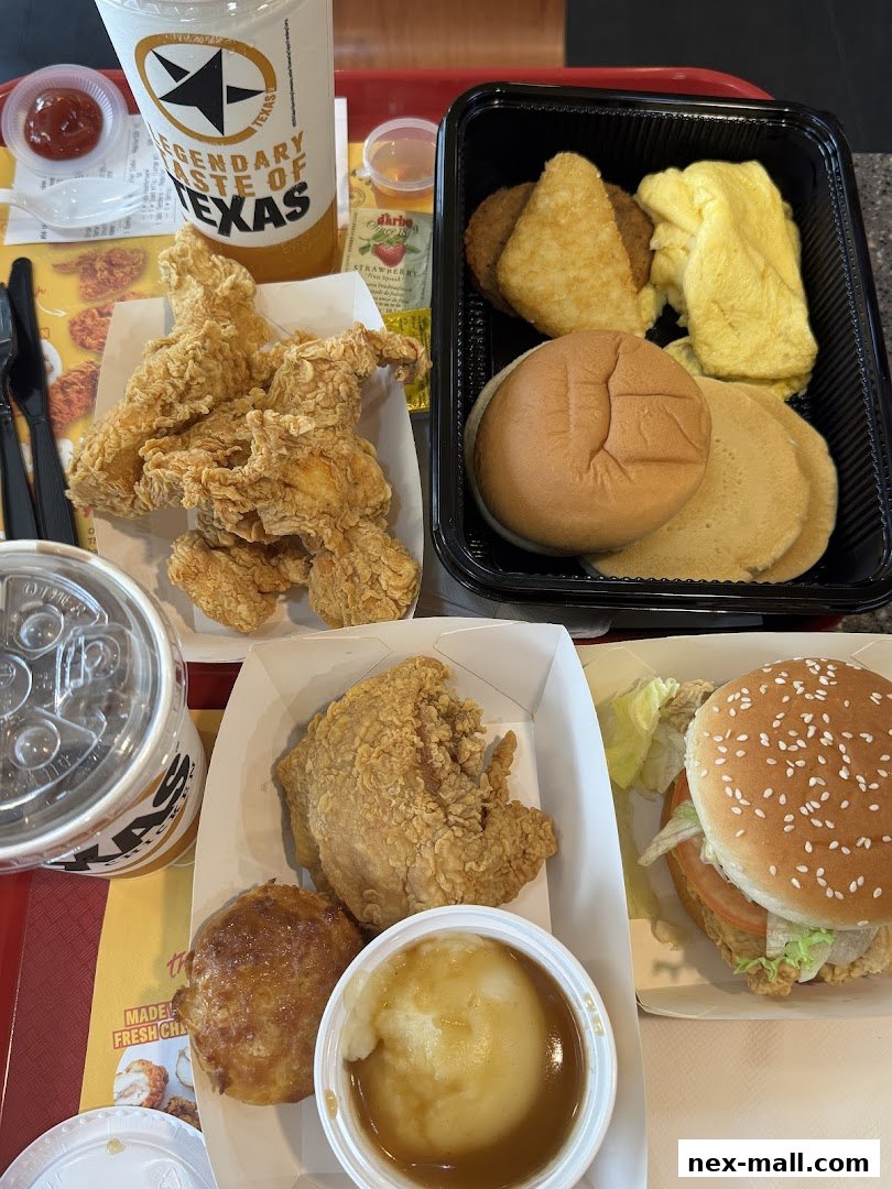 A spread of fried chicken, mashed potatoes, a burger, and breakfast items from Texas Chicken.