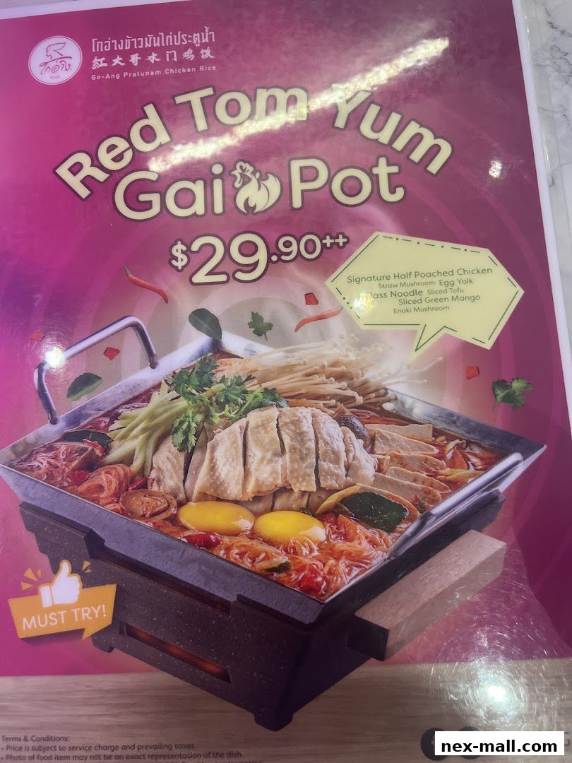A menu item for Red Tom Yum Gai Pot from Go-Ang Pratunam Chicken Rice.