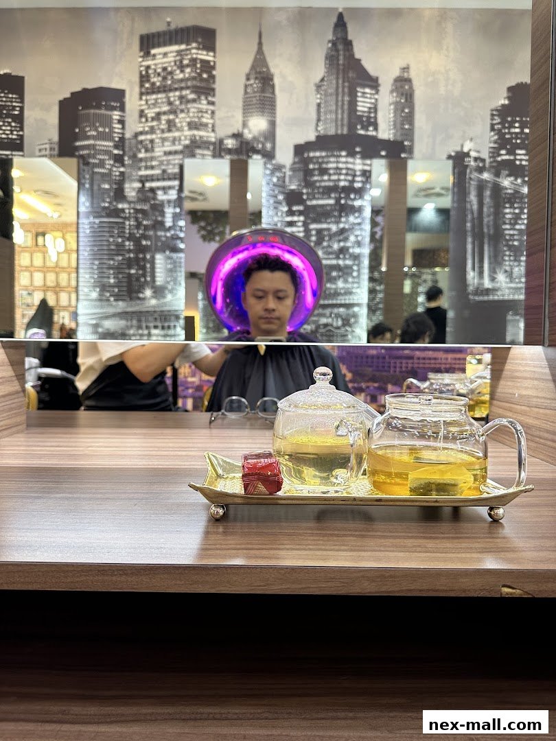 A person with a futuristic hair treatment helmet sits in a salon with a city skyline backdrop.