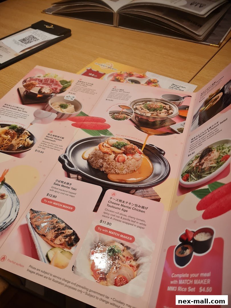 A close-up view of a Japanese restaurant menu featuring various dishes with enticing food photography.