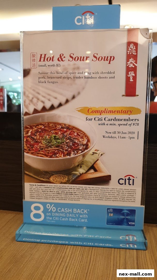 A menu display for Din Tai Fung featuring Hot & Sour Soup and a Citi card promotion.
