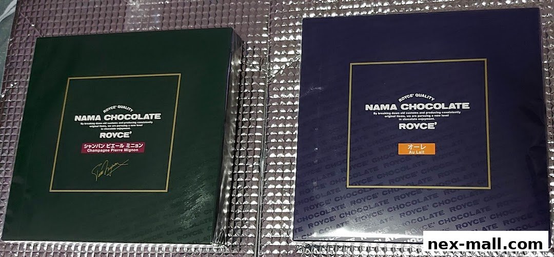 Two boxes of Royce Nama Chocolate, one green and one blue, are displayed.
