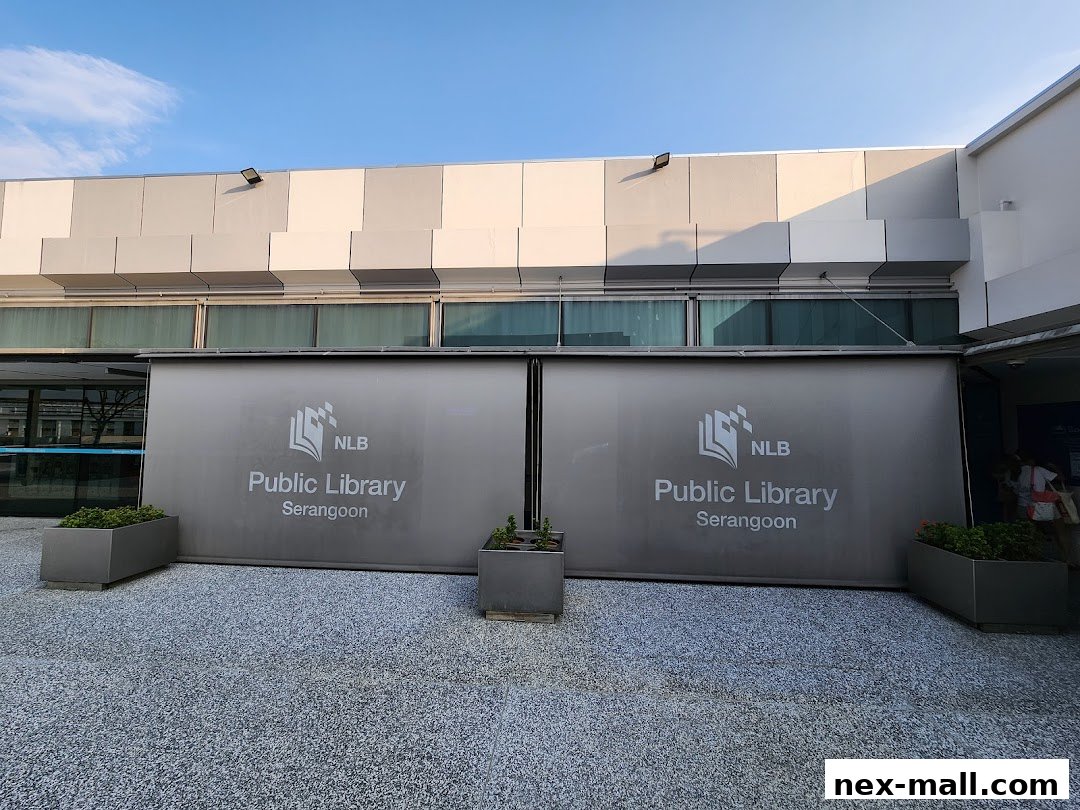 The exterior of Serangoon Public Library with its prominent signage and planters.