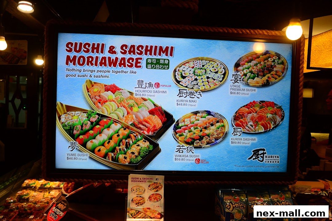 A brightly lit menu board showcasing various sushi and sashimi platters from JOY Japanese Food Street NEX.