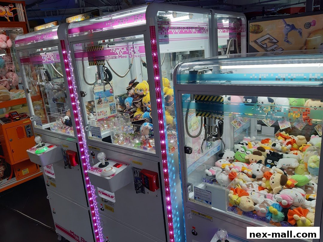 Several brightly lit claw machines filled with plush toys are displayed.