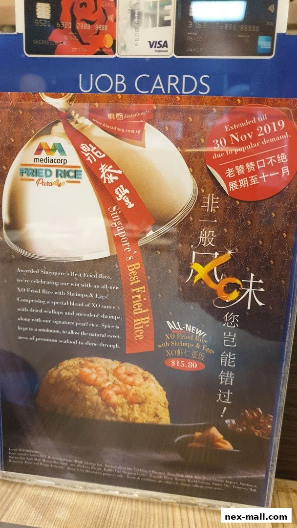 A promotional menu for Din Tai Fung's XO Fried Rice with Shrimps & Eggs.