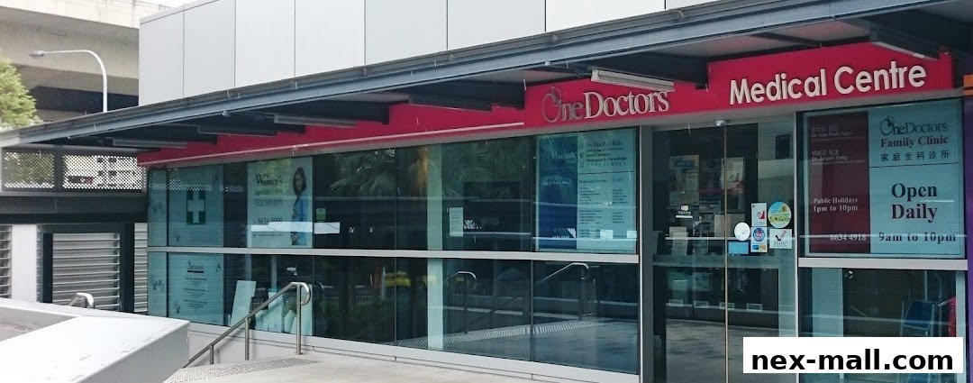 The exterior of OneDoctors Medical Centre, featuring large glass windows and clear signage.