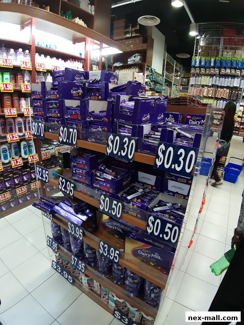 A display of Cadbury Dairy Milk chocolate bars and other products at Valu.