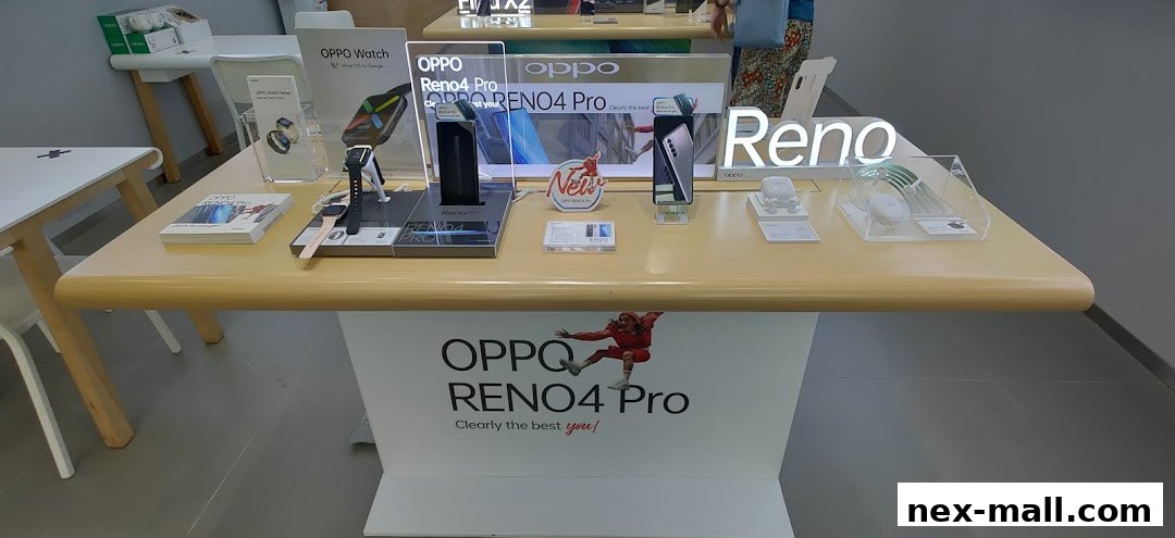 OPPO Reno4 Pro phones and watches displayed on a table in a store.