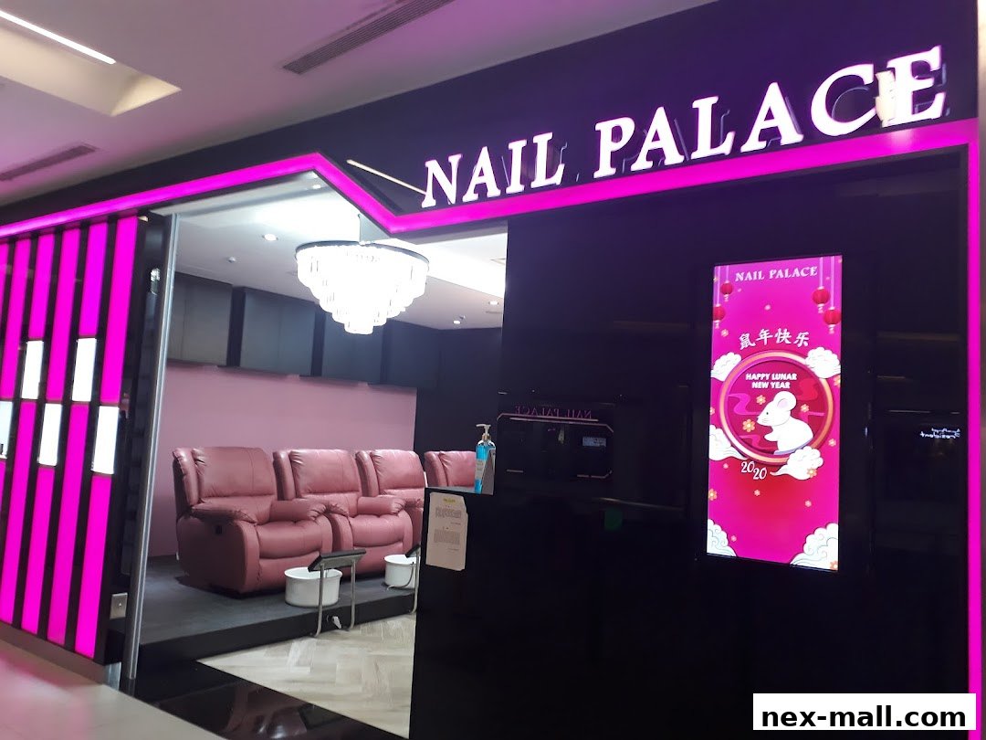 The entrance of Nail Palace, featuring plush seating and a bright, modern design.