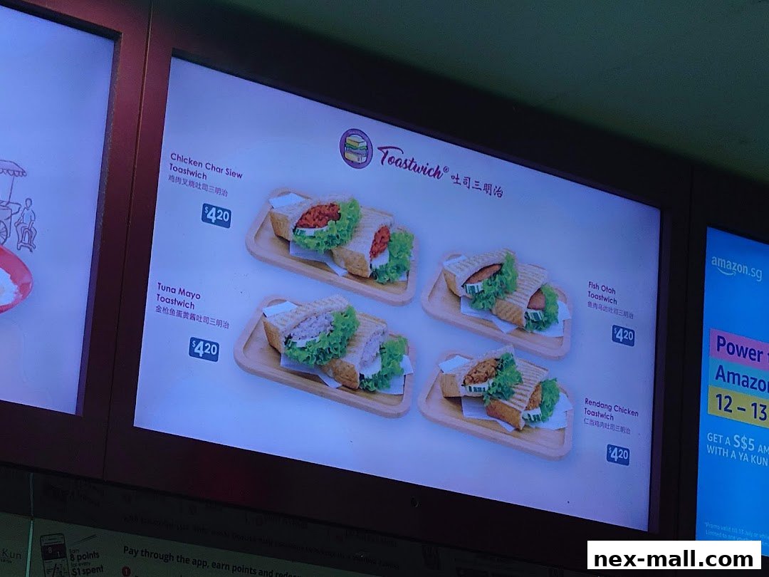 A menu board displaying various Toastwich sandwiches with prices.