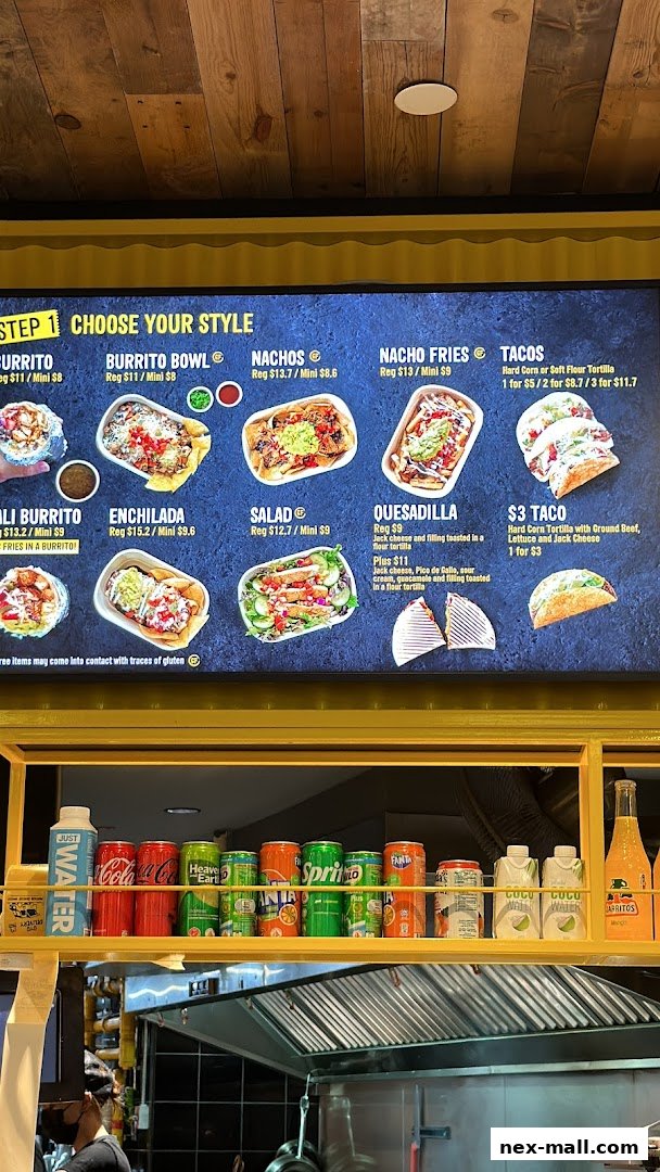 A digital menu board displaying various Mexican food options and drinks.