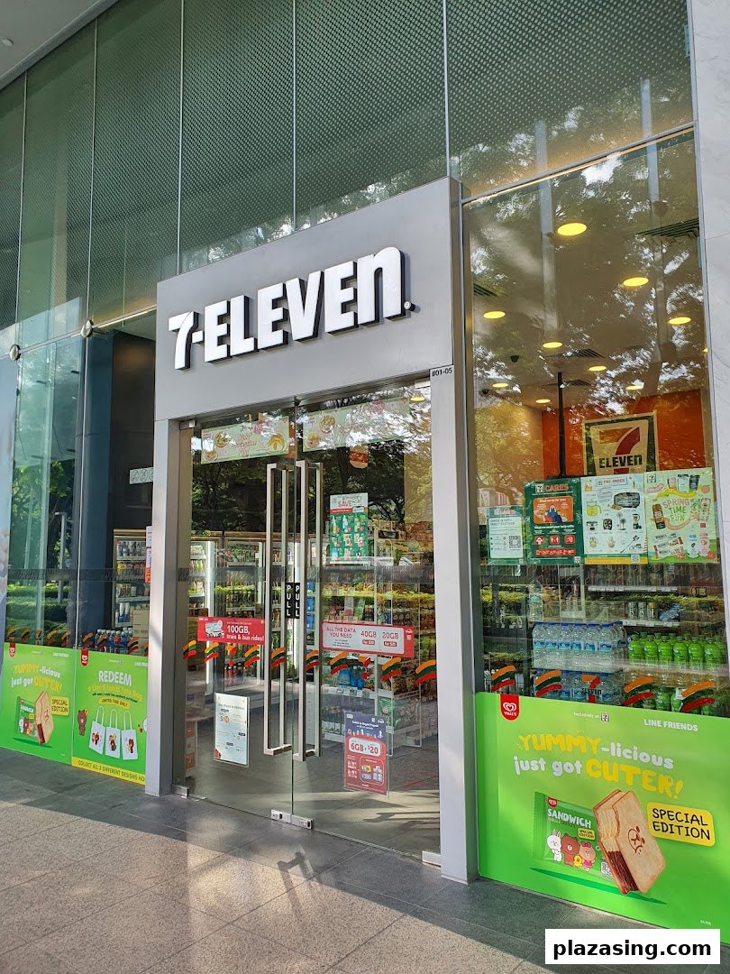 The image shows the brightly lit exterior and entrance of a 7-Eleven convenience store.