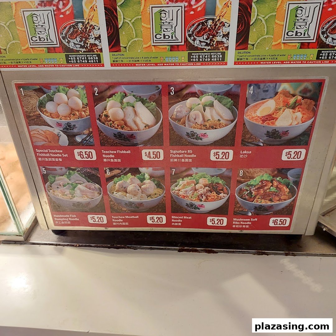 A vibrant menu board showcasing various Teochew noodle dishes with prices and images.