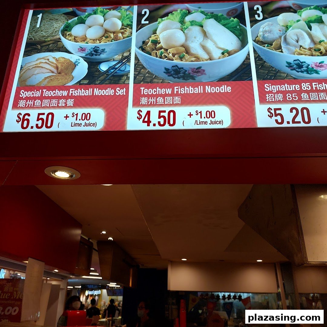 A digital menu board showcasing various Teochew fishball noodle dishes with their prices and images.