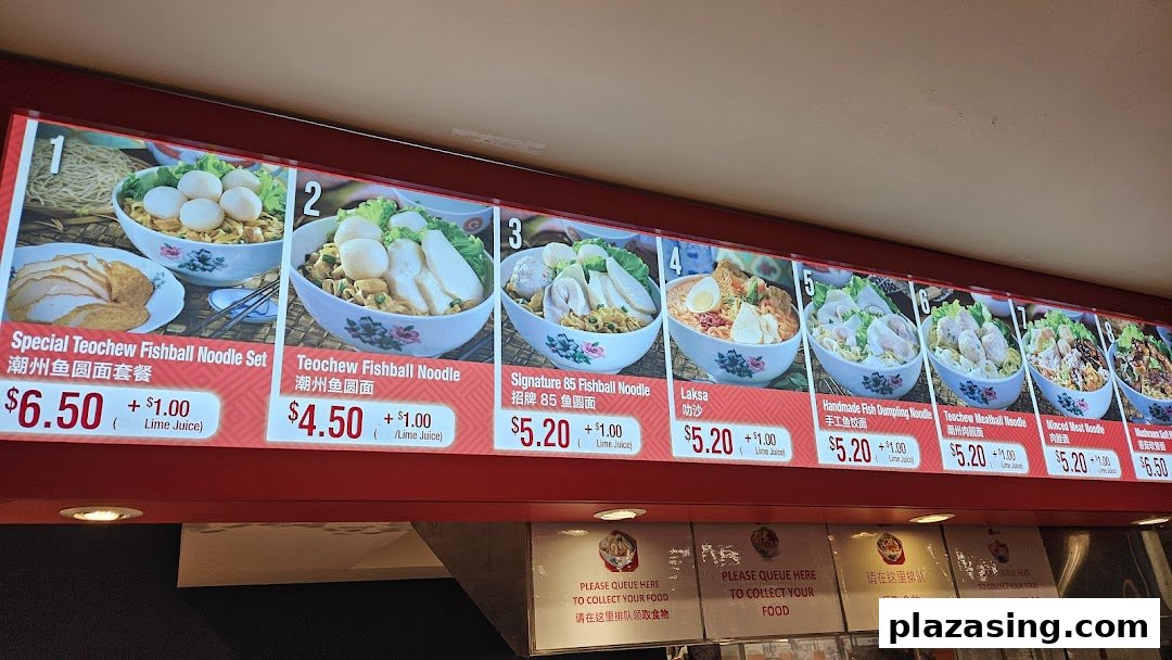 A digital menu board displaying various Teochew fishball and noodle dishes with prices.