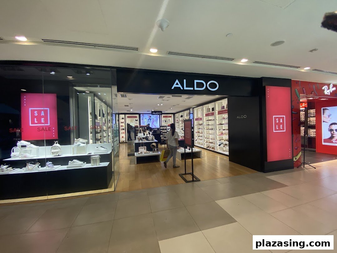 The ALDO shop entrance features a wide selection of footwear and accessories, with prominent 'SALE' signs.